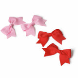Flitzy pink and red bow clips pack of 4, imported from the UK