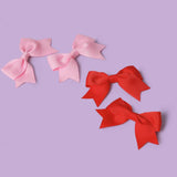 Flitzy pink and red bow clips pack of 4, imported from the UK