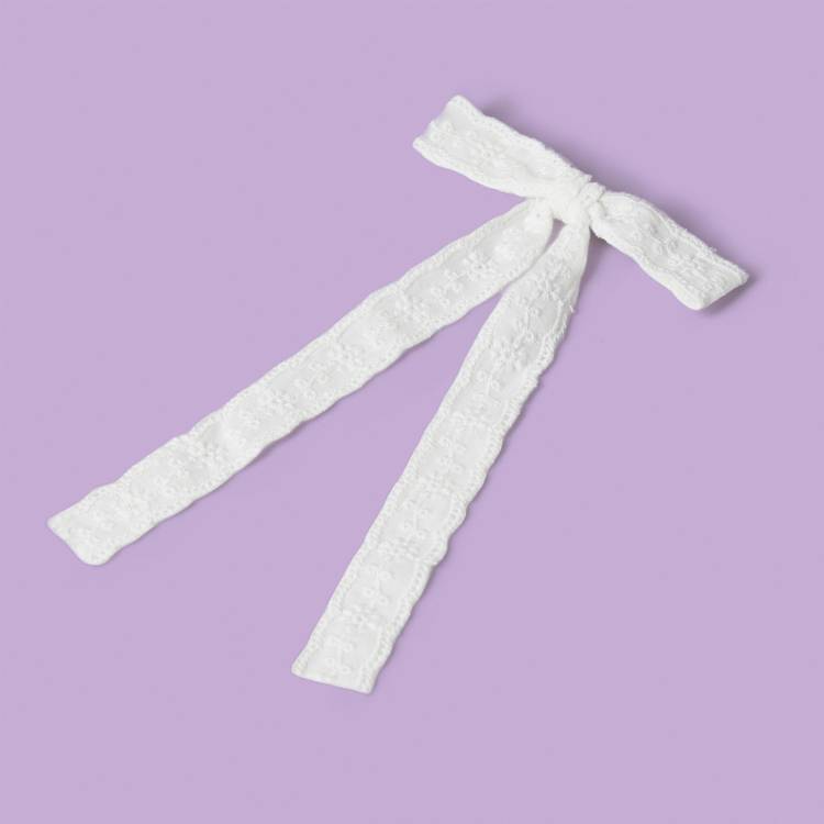 Flitzy white lace bow hairclip, imported from the UK