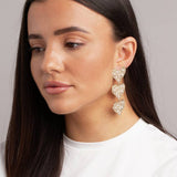 Freedom triple heart drop earrings with pearl accents (British brand)