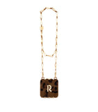 Rabanne antique gold luminizer 9.1g and leopard clutch bag, UK version