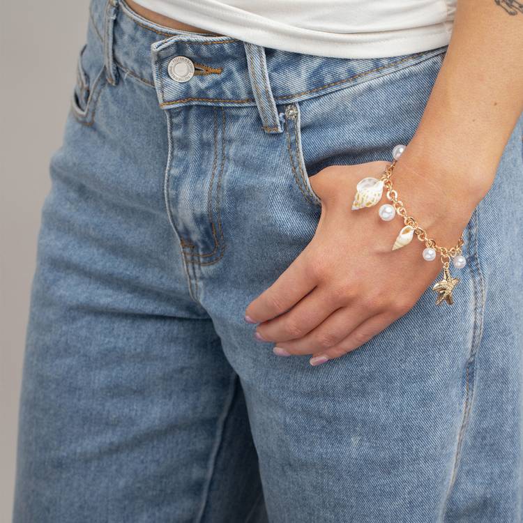 Freedom gold tone pearl shell charm bracelet, UK version