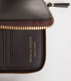 Comme des Garçons small leather vertical wallet, UK version