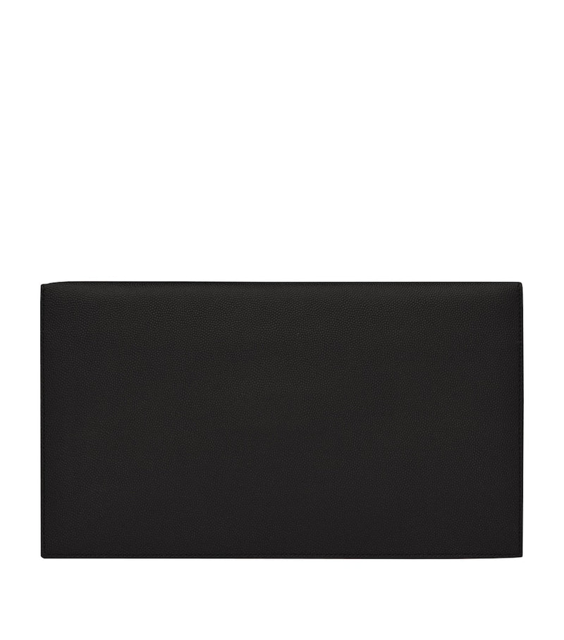 Saint Laurent Uptown leather clutch bag with YSL monogram, UK version