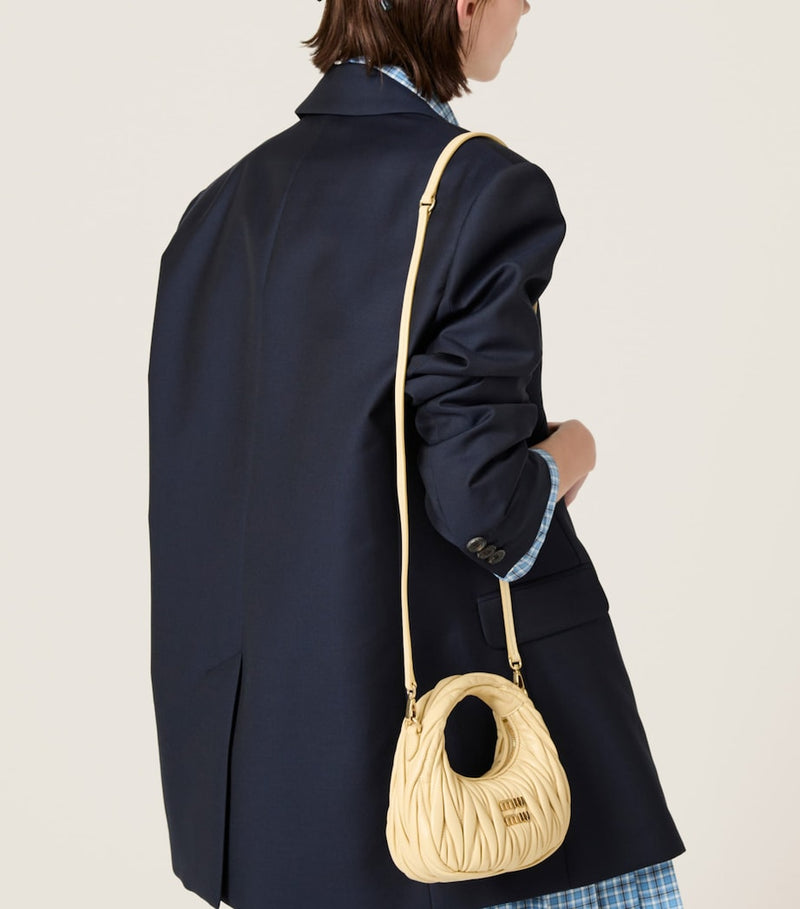 Miu Miu Wander matelassé leather top-handle bag (British brand)