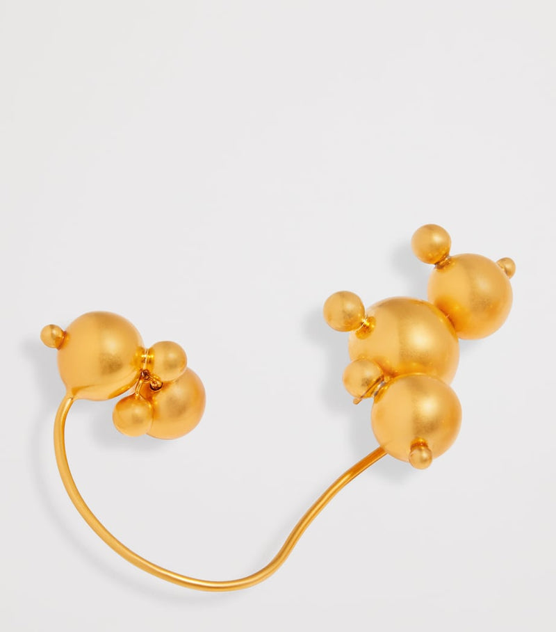 Schiaparelli gold-plated spheres ear cuffs (British brand)