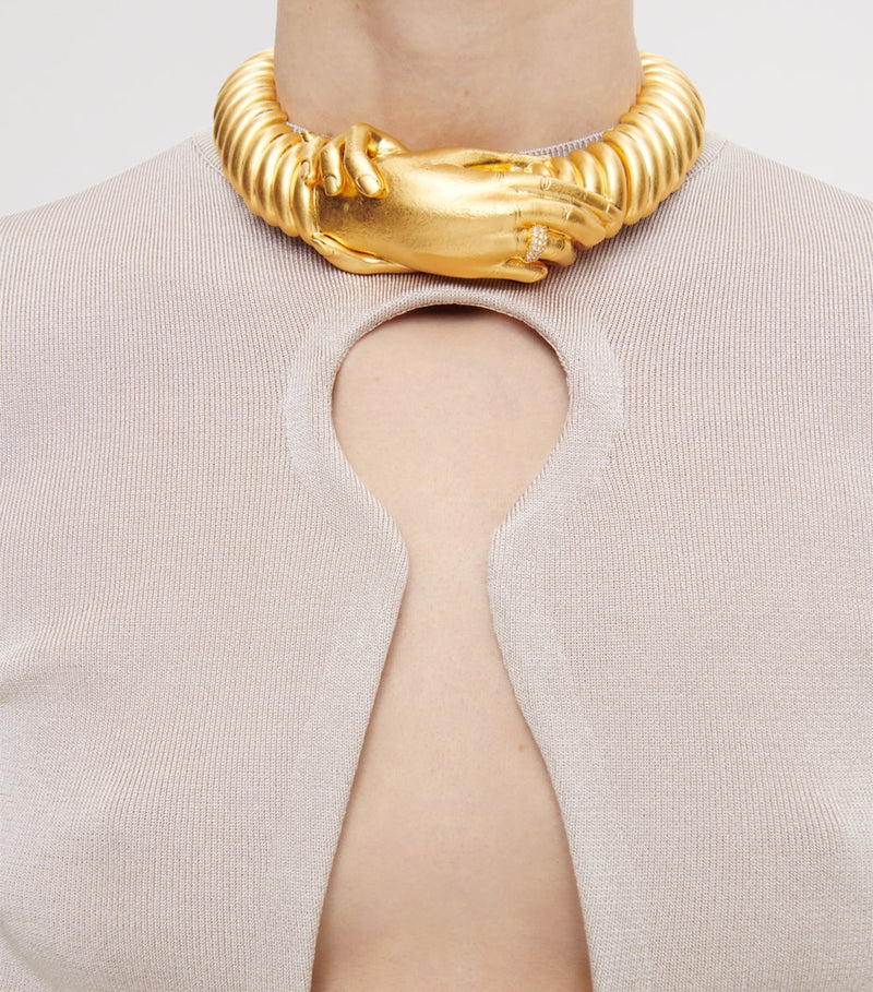 Schiaparelli Hand in Hand necklace, imported from the UK