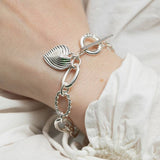 Lipsy silver plated heart charm bracelet, UK version