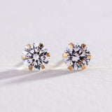 Revere 9ct gold cubic zirconia stud earrings, imported from the UK