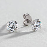 Argos Revere 9ct White Gold Round Cubic Zirconia Stud Earrings- Buy online at McGrocer