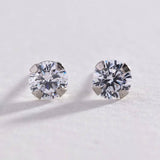 Revere 9ct white gold cubic zirconia stud earrings 4mm (British brand)