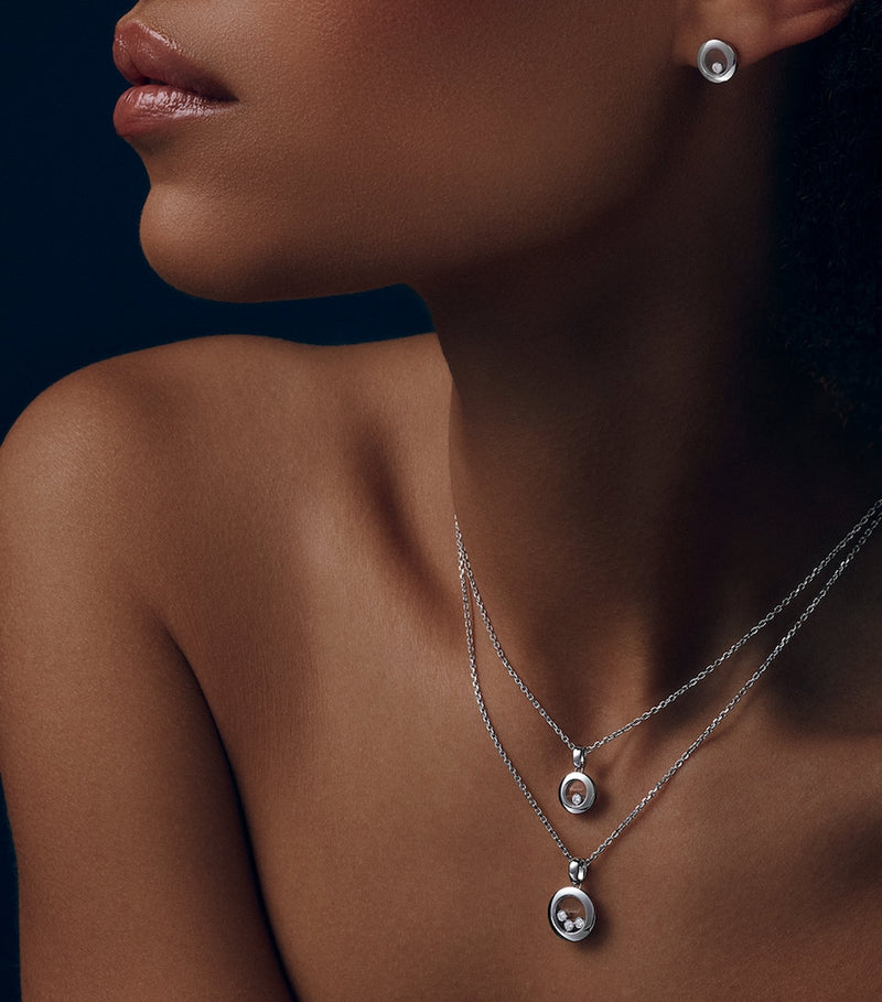 Chopard white gold Happy Diamonds earrings with dancing diamond, UK version