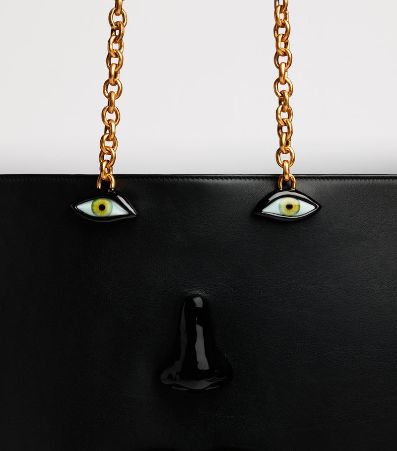 Schiaparelli calfskin face tote bag with anatomical details (British brand)