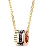 Boucheron extra small mixed gold diamond Quatre Classique pendant - British product