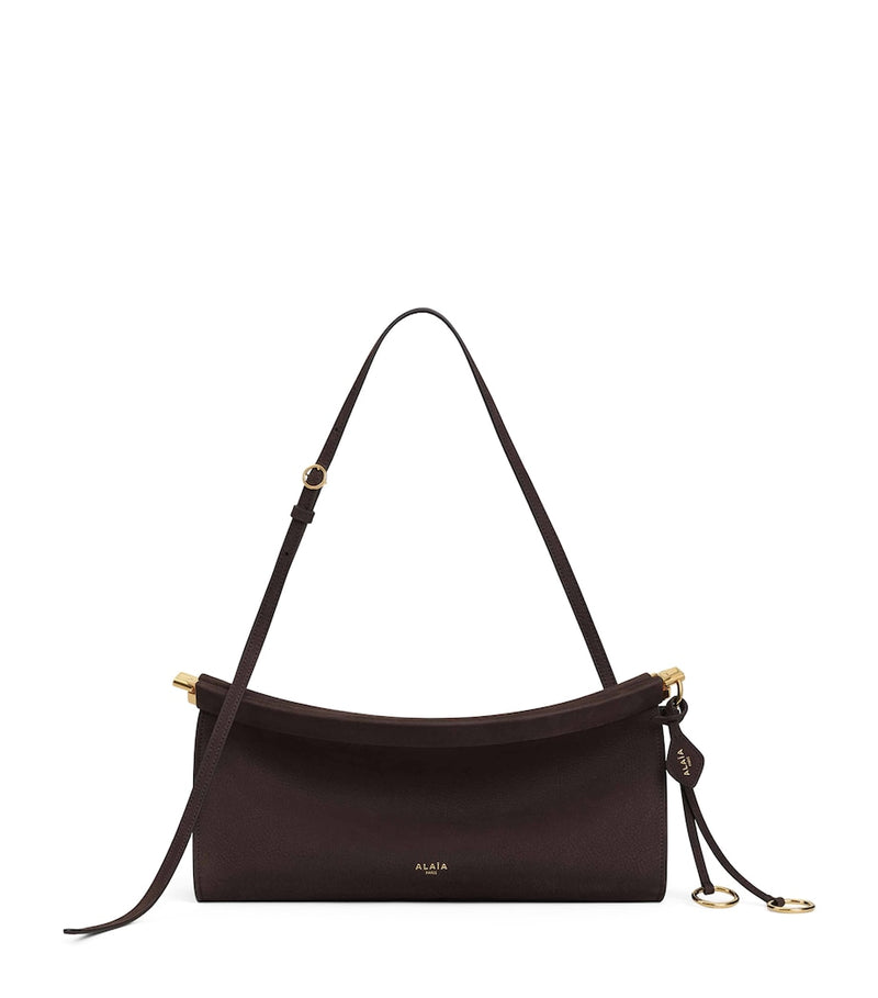 Alaïa Le Click East West shoulder bag, imported from the UK