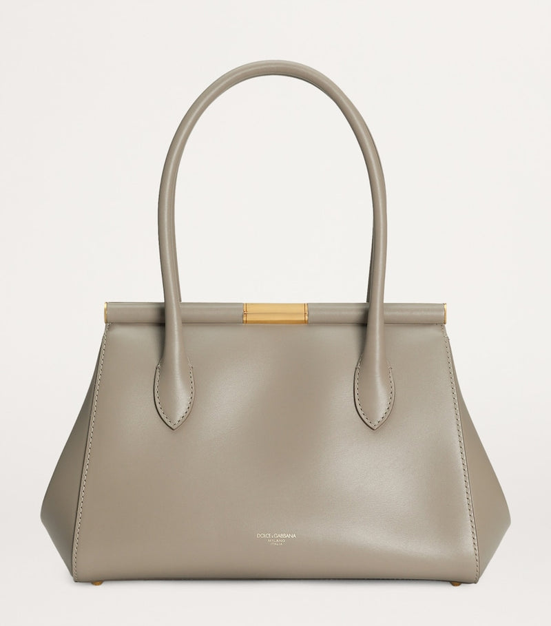Dolce&Gabbana leather top-handle bag with gold-tone hardware, imported from the UK
