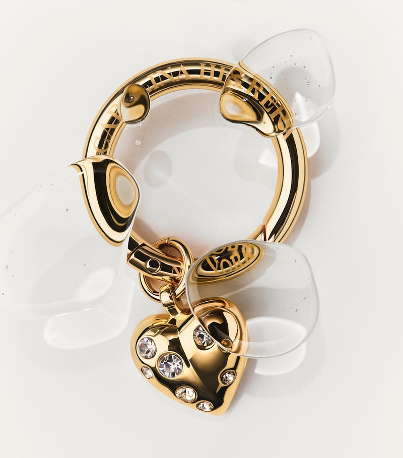 Carolina Herrera crystal heart charm lipstick accessory, imported from the UK