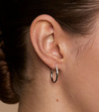 Astrid & Miyu pavé knot hoop earrings (British brand)