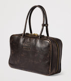 Miu Miu Beau nappa leather top-handle bag (British brand)