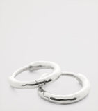 Monica Vinader silver huggie earrings with textured finish, imported from the UK