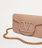 Valentino Garavani Small Leather Locò shoulder bag, imported from the UK