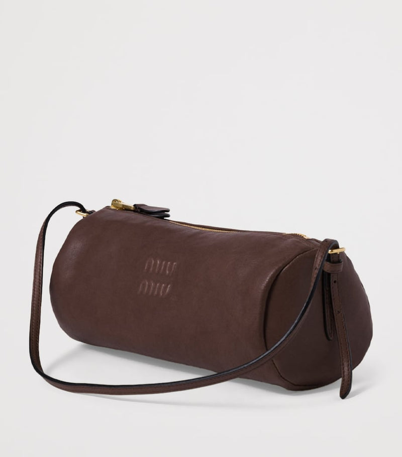 Miu Miu leather pouch with embossed logo, imported from the UK