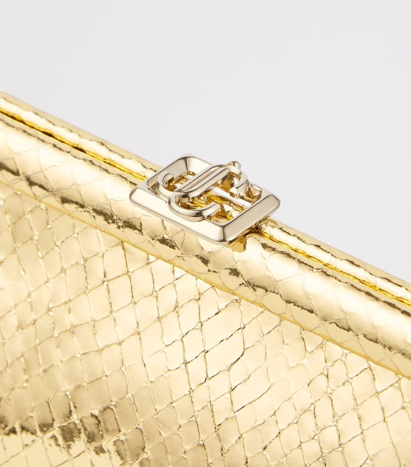Jimmy Choo snake-embossed leather clutch bag, imported from the UK