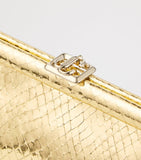 Jimmy Choo snake-embossed leather clutch bag, imported from the UK