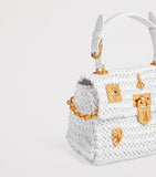 Schiaparelli mini calfskin bijoux secret top-handle bag, imported from the UK