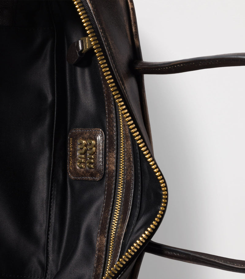 Miu Miu Leather Beau top-handle bag, imported from the UK