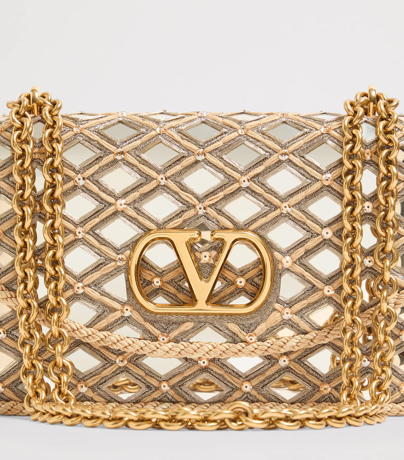 Valentino Garavani Vain shoulder bag with rhinestone embellishments (British brand)