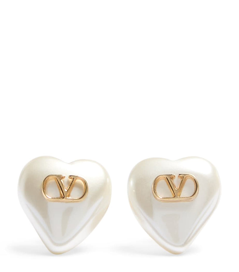 Valentino Garavani VLogo heart earrings in faux pearl and gold tone, imported from the UK