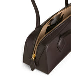 Alaïa Le Teckel shoulder bag in smooth calfskin, imported from the UK