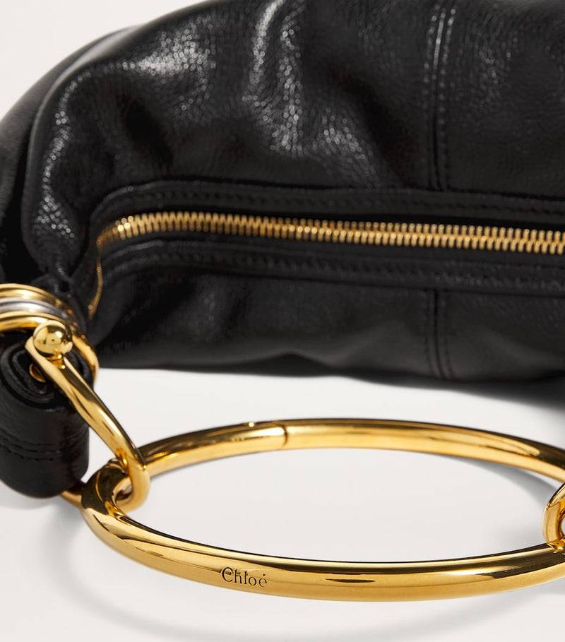 Chloé small leather top-handle bracelet bag, UK version