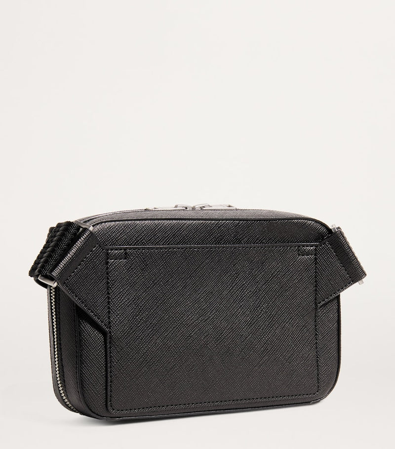 Sandro Paris small recycled leather cross-body bag, imported from the UK