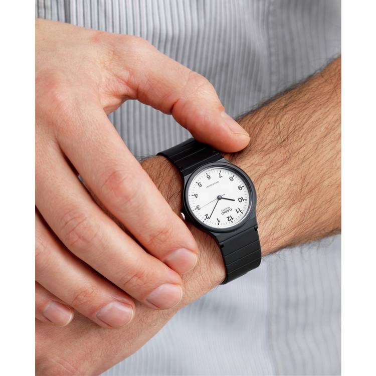 Casio analogue watch with white dial and black resin strap (British brand)