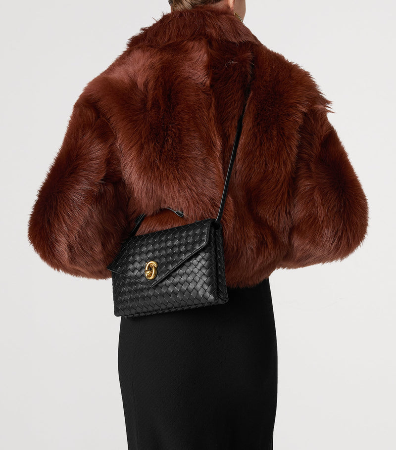 Bottega Veneta Knot Lock handbag imported from the UK