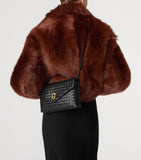 Bottega Veneta Knot Lock handbag imported from the UK