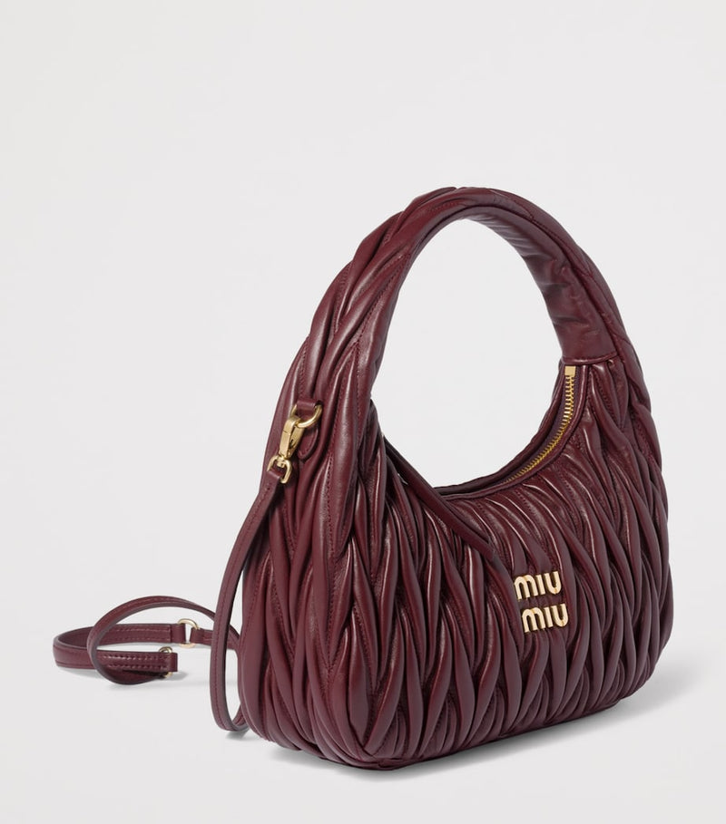 Miu Miu Wander matelassé leather top-handle bag (British brand)