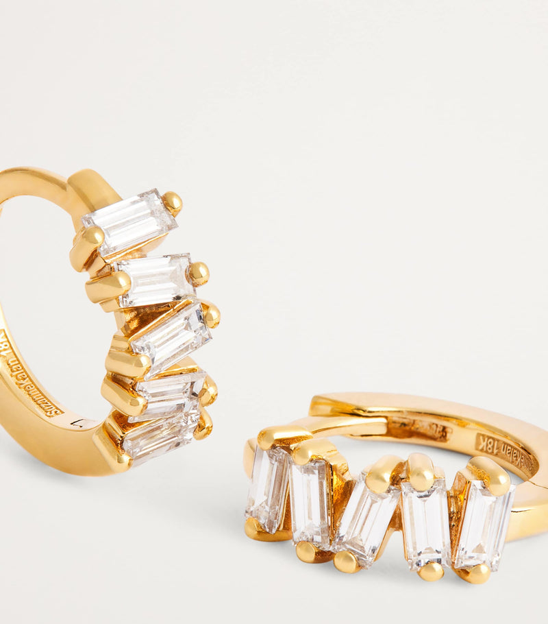 Suzanne Kalan yellow gold huggie earrings with baguette diamonds (British brand)