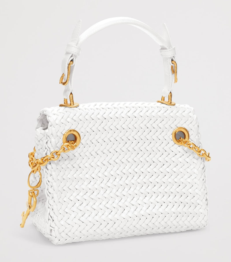 Schiaparelli mini calfskin bijoux secret top-handle bag, imported from the UK