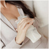 Nuby single manual breast pump with 180ml bottle and accessories, UK version