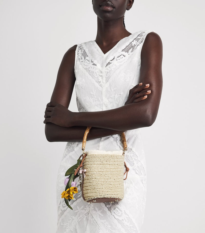 Self-Portrait mini raffia bucket bag, imported from the UK