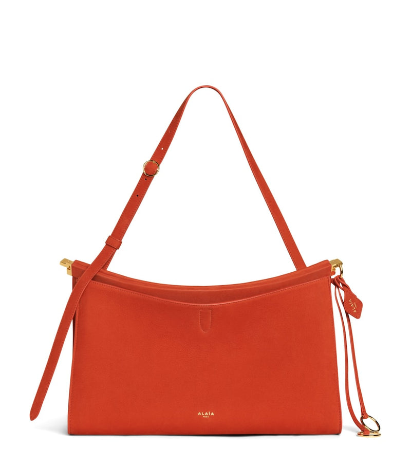Alaïa Le Click Pocket 35 nubuck leather shoulder bag - British product