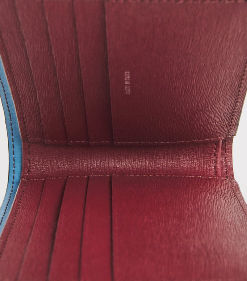 Paul Smith leather bifold wallet with Signature Stripe lining, imported from the UK