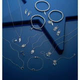 Revere silver wing drop earrings, UK version