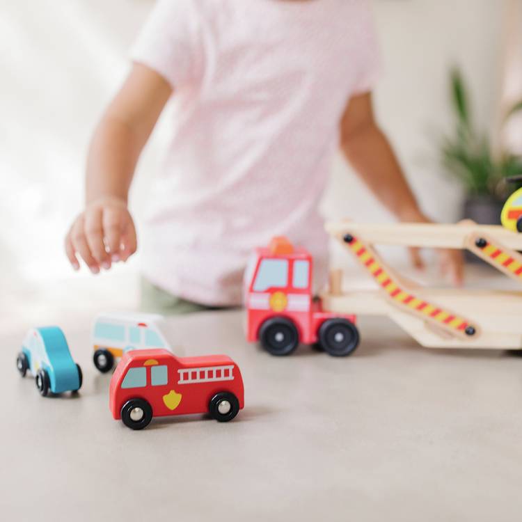 Melissa & Doug Wooden Emergency Vehicle Transporter Truck, imported from the UK