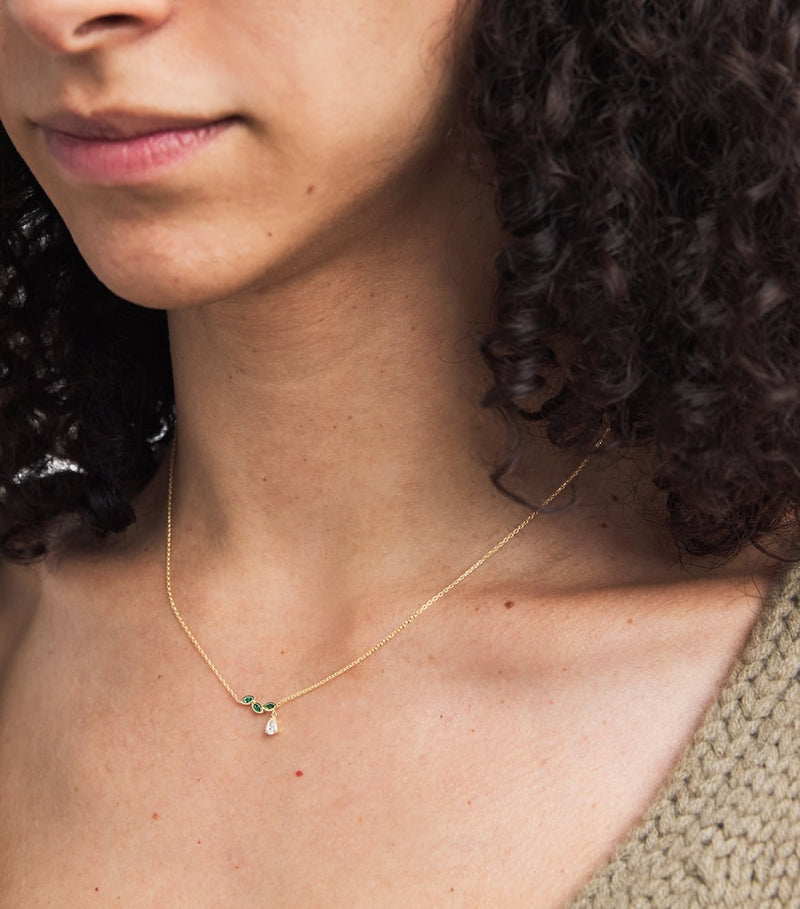 Astrid & Miyu yellow gold emerald diamond necklace, imported from the UK