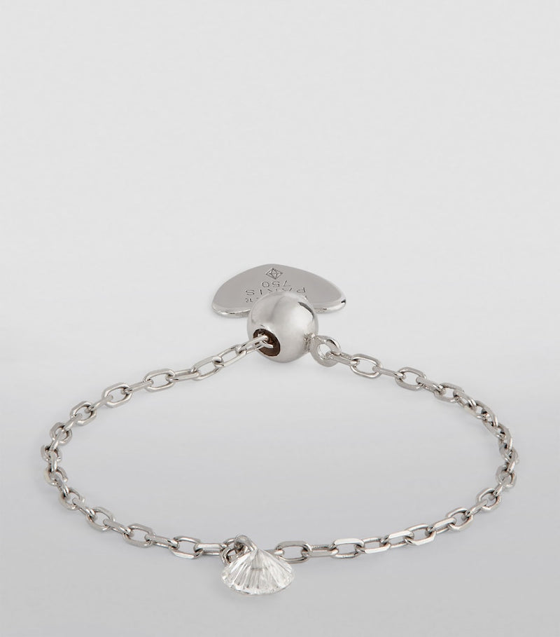 Persée white gold ring with floating diamond, UK version