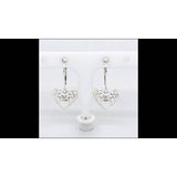 Revere diamond drop earrings April, UK version